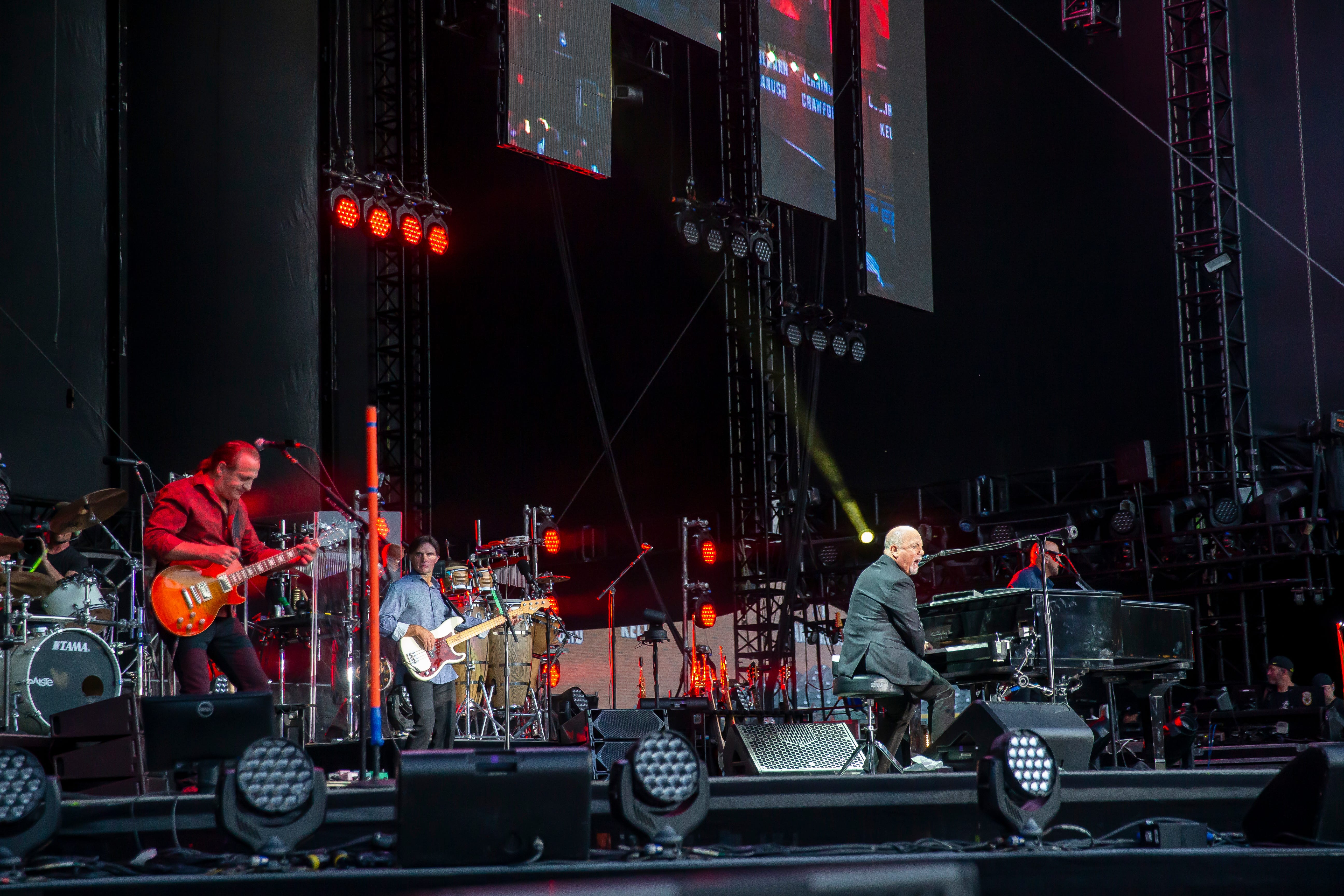 Billy Joel performs with his band at Comerica Park.
