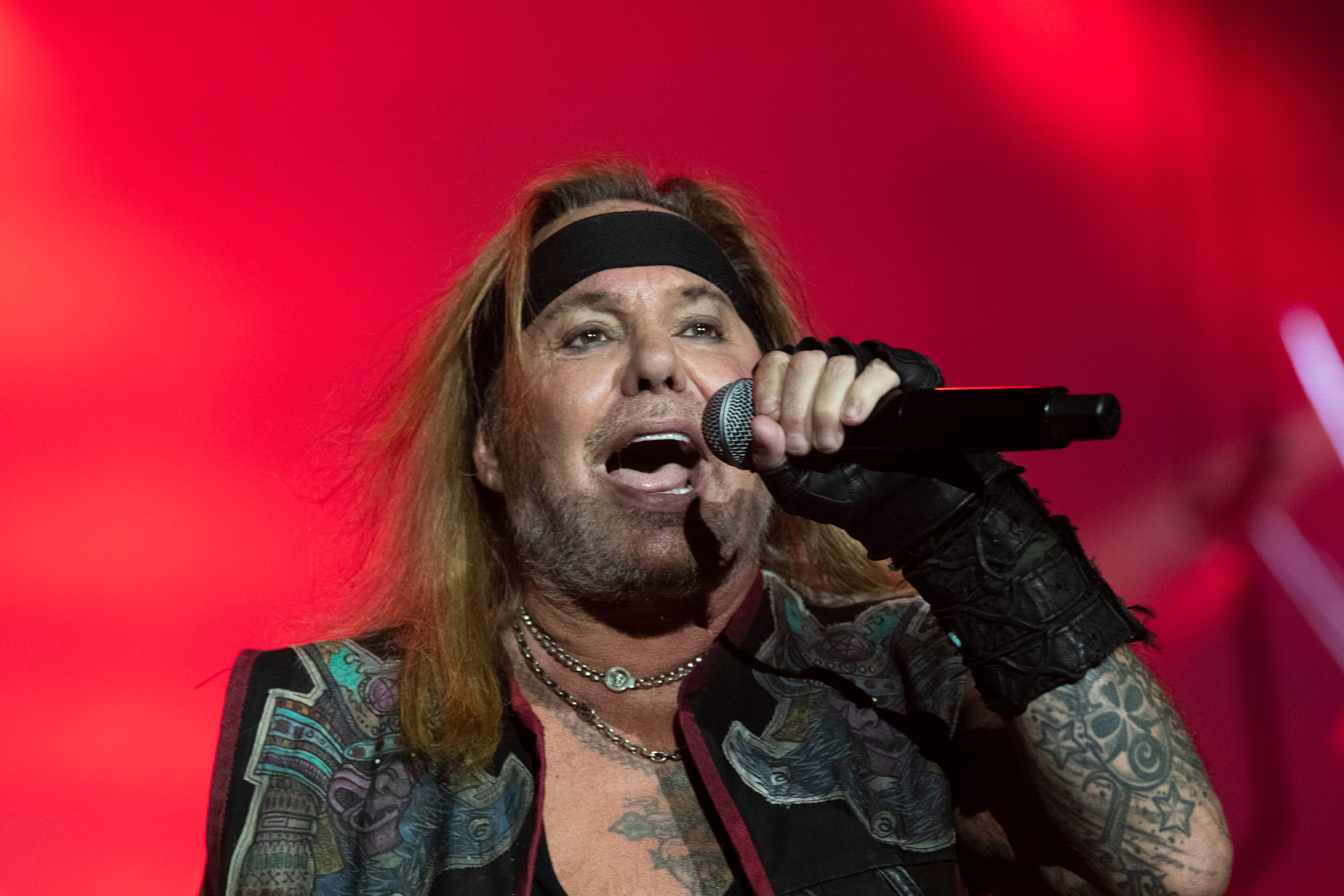 Motley Crue singer Vince Neil sings Shout at the Devil as 80’s rock legends Def Leppard and Motley Crue headline the Stadium Tour at Comerica Park in Detroit on Sunday, July 10, 2022.
