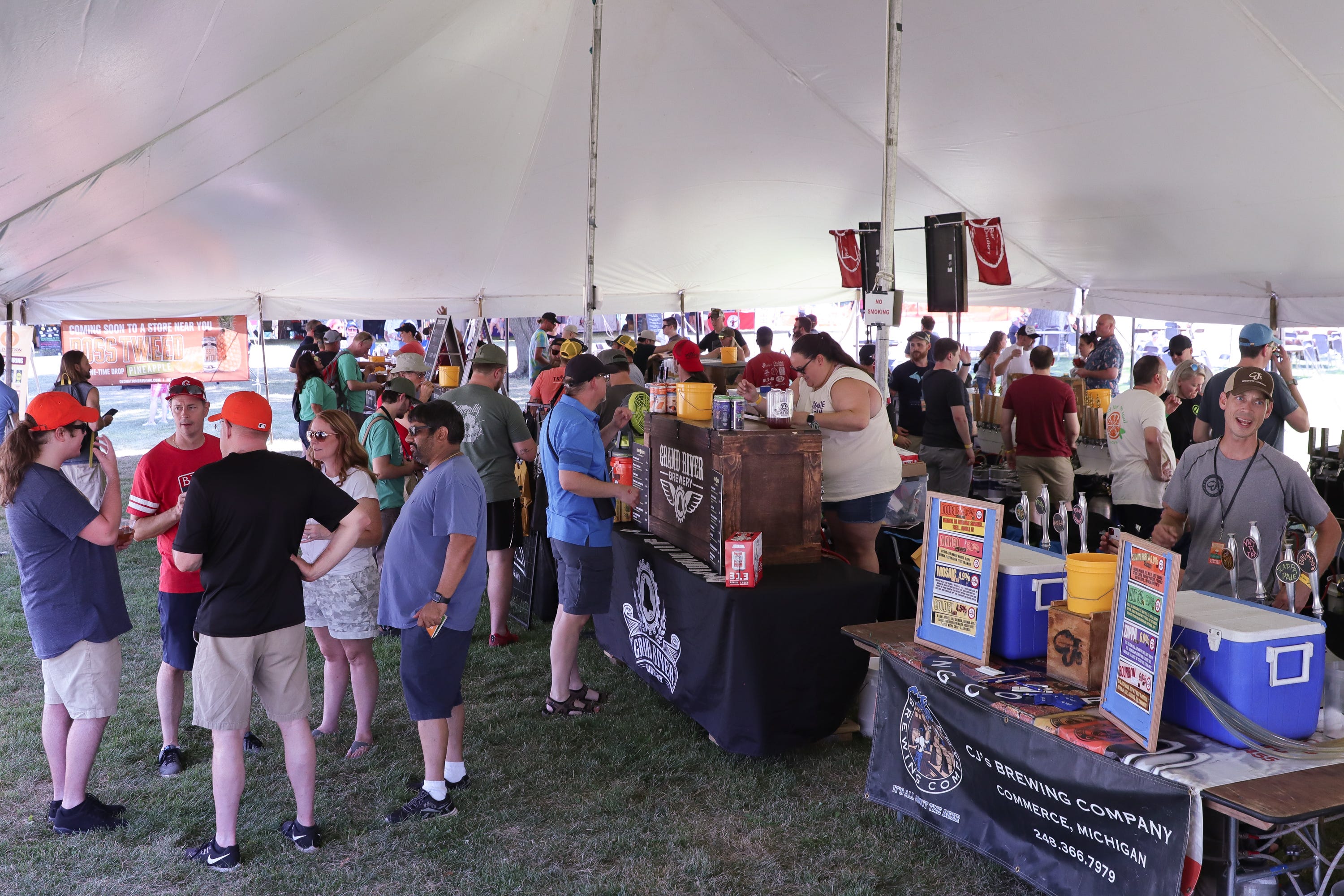 A look inside Tent 2 at the Michigan Brewers Guild's Summer Beer Festival in Ypsilanti's Riverside Park on Friday, July 22, 2022.