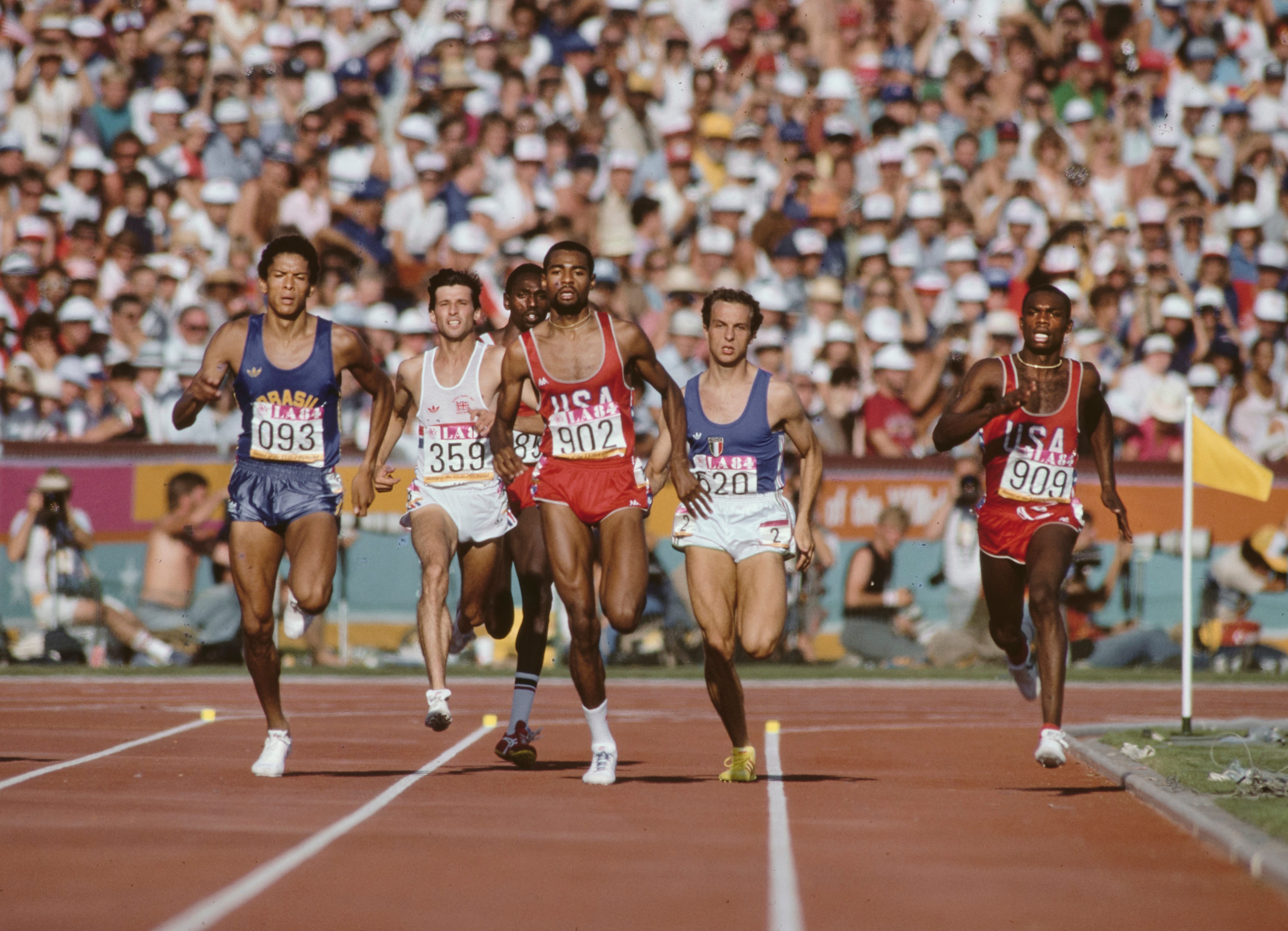 Gold medalist Joaquim Cruz #093 from Brazil leads from Johnny Gray #902 of the United States, Donato Sabia #520 of Italy and Earl Jones #909 of the United States running in the final of the Men's 800m metres race on 6th August 1984 during the XXIII Olympic Summer Games at the Los Angeles Memorial Coliseum in Los Angeles, California, United States.