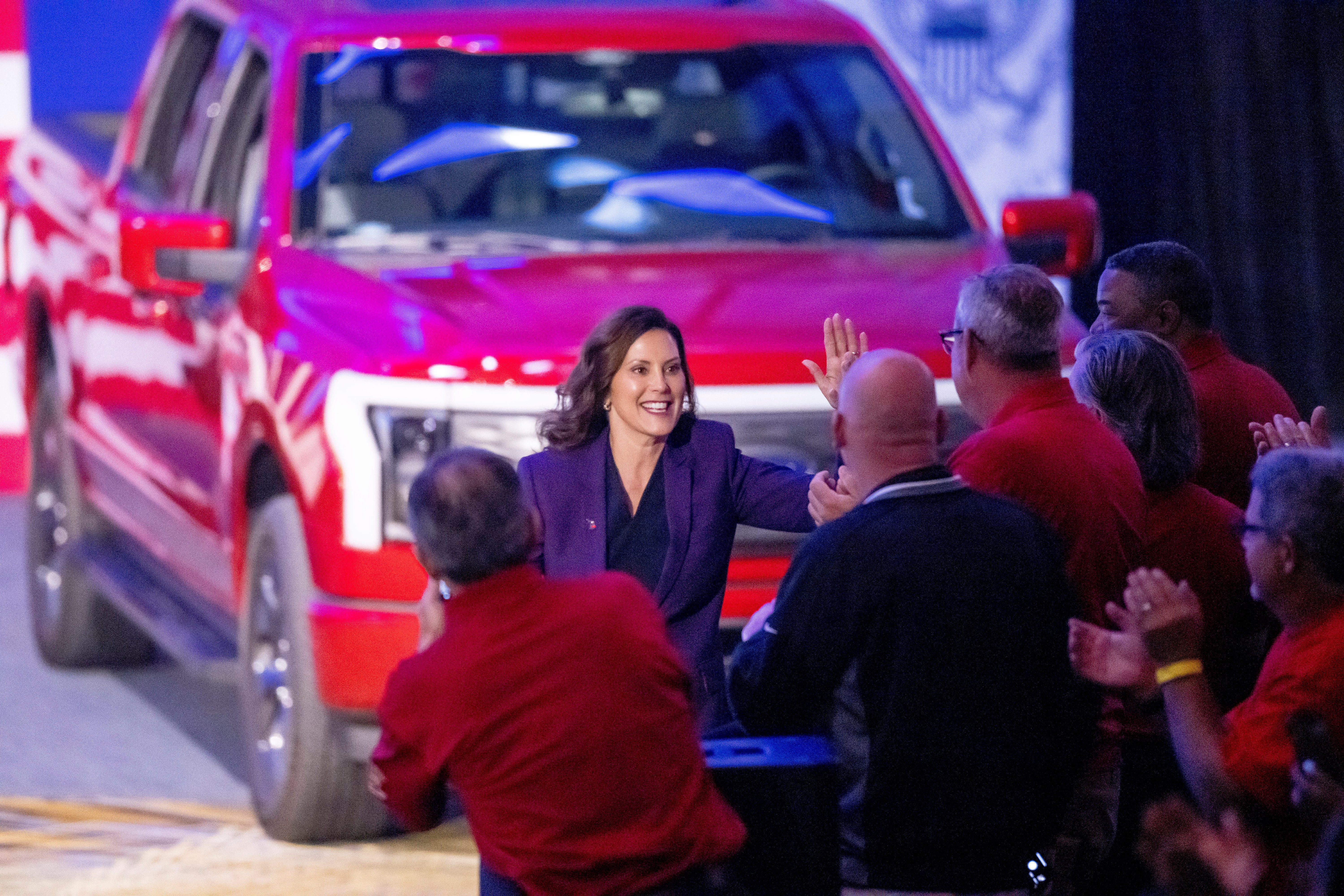 Michigan Governor Gretchen Whitmer comes out to make a speech before an appearance by President Joe Biden at the North American International Auto Show at Huntington Place, in Detroit, September 14, 2022.