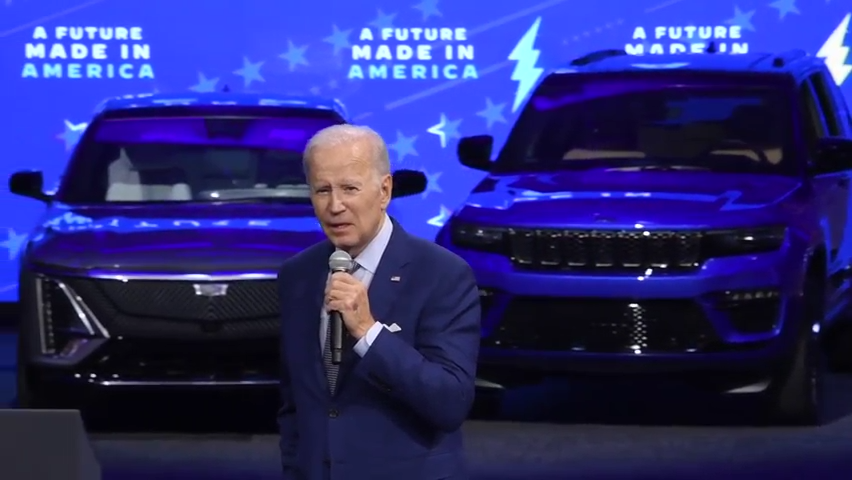 “The great American road trip is going to be fully electrified,” says Biden