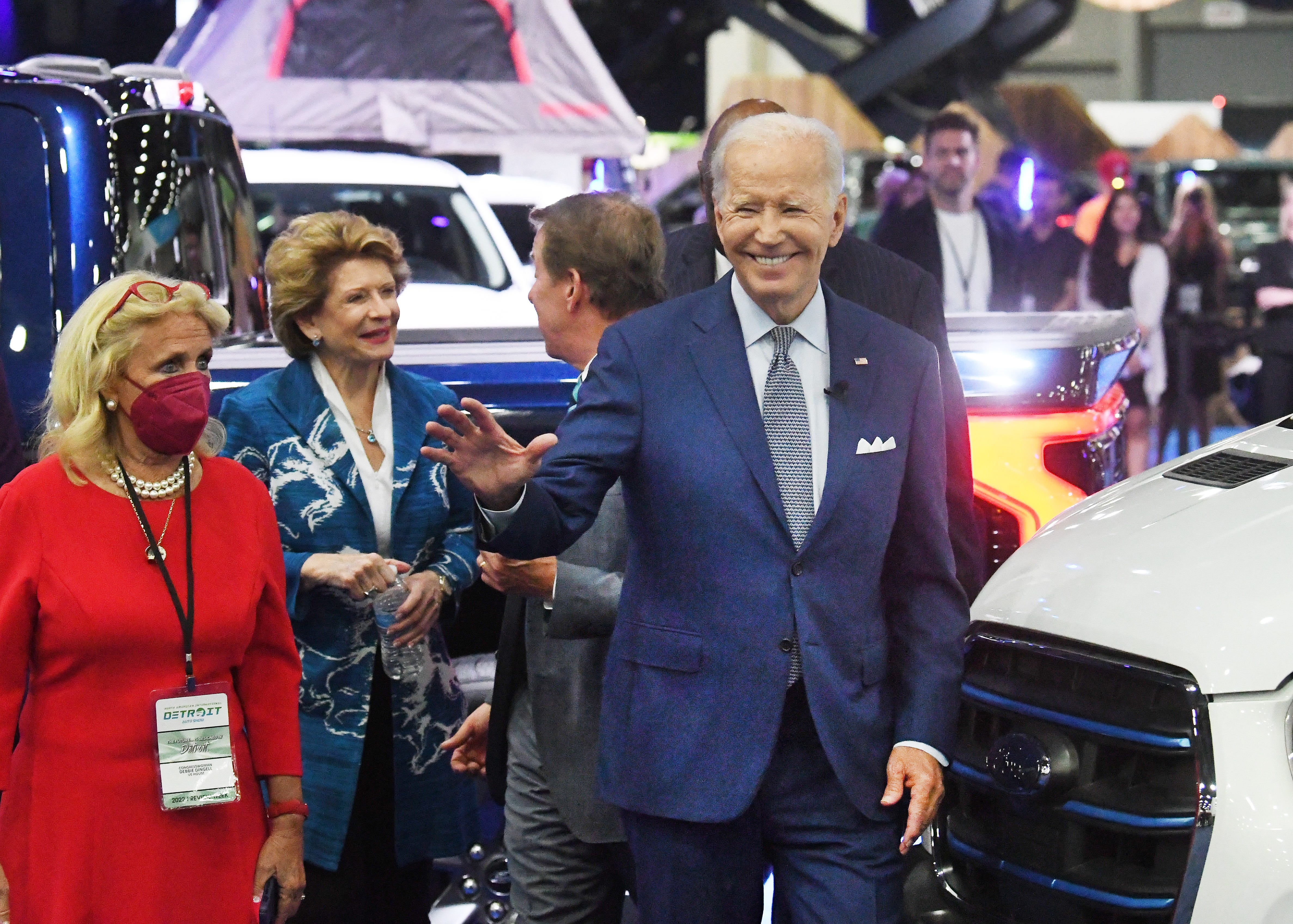 President Joe Biden waves to visitors during a tour of the 2022 North American International Auto Show on Media Day in Detroit, Michigan on September 14, 2022.