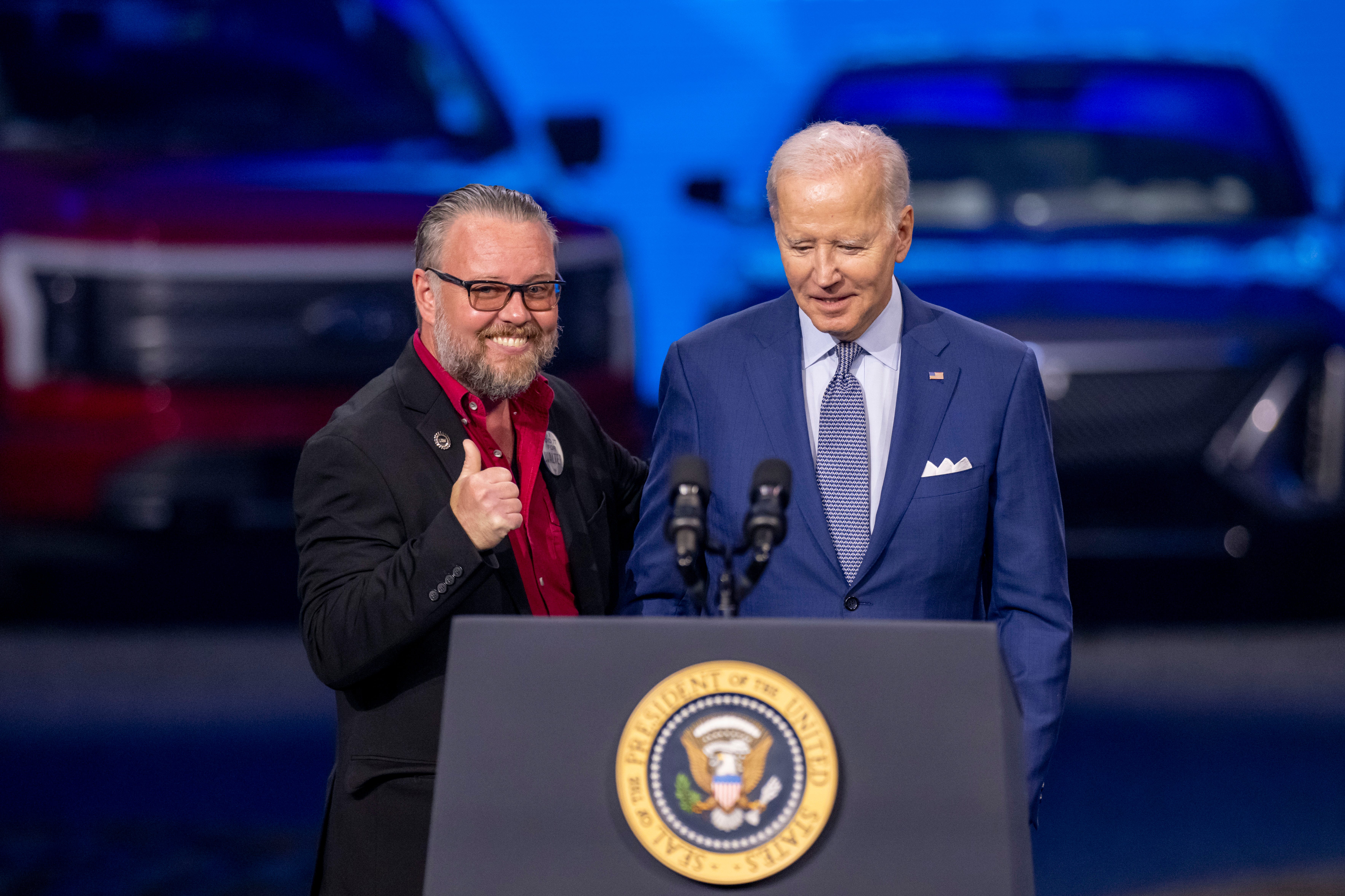 Ryan Buchalski, President of UAW Local 598, gives a thumbs up after introducing President Joe Biden at the North American International Auto Show at Huntington Place, in Detroit, September 14, 2022.