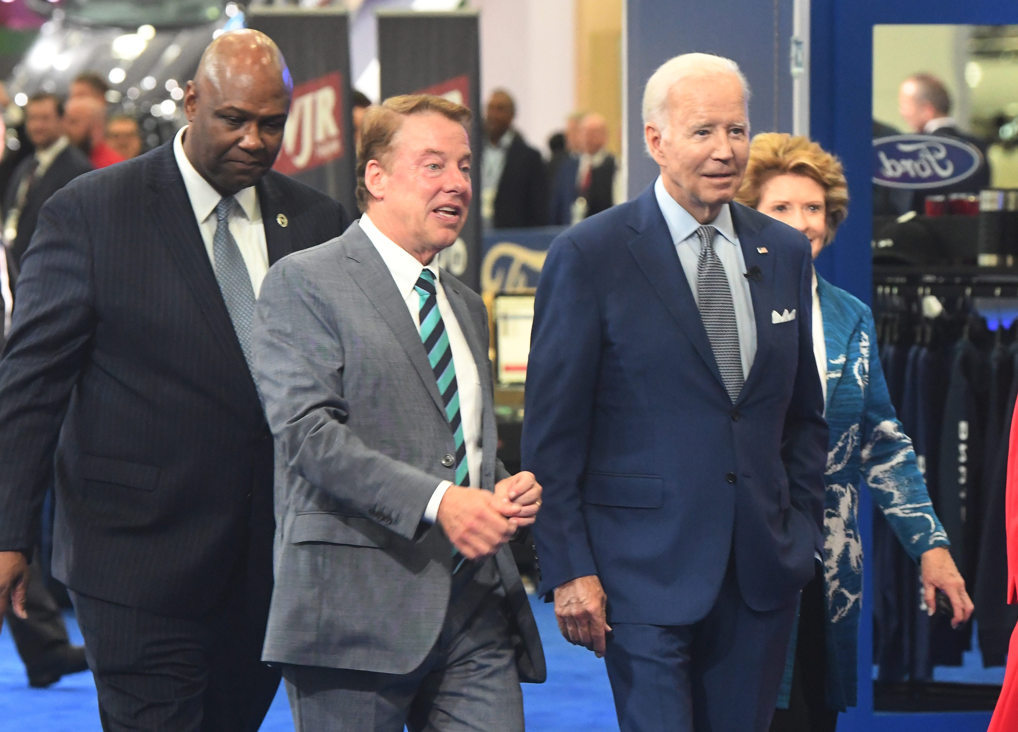 Executive Chair of Ford Motor Company William Clay Ford Jr. shows President Joe Biden the Ford display during a tour of the 2022 North American International Auto Show in Detroit, Michigan on September 14, 2022.