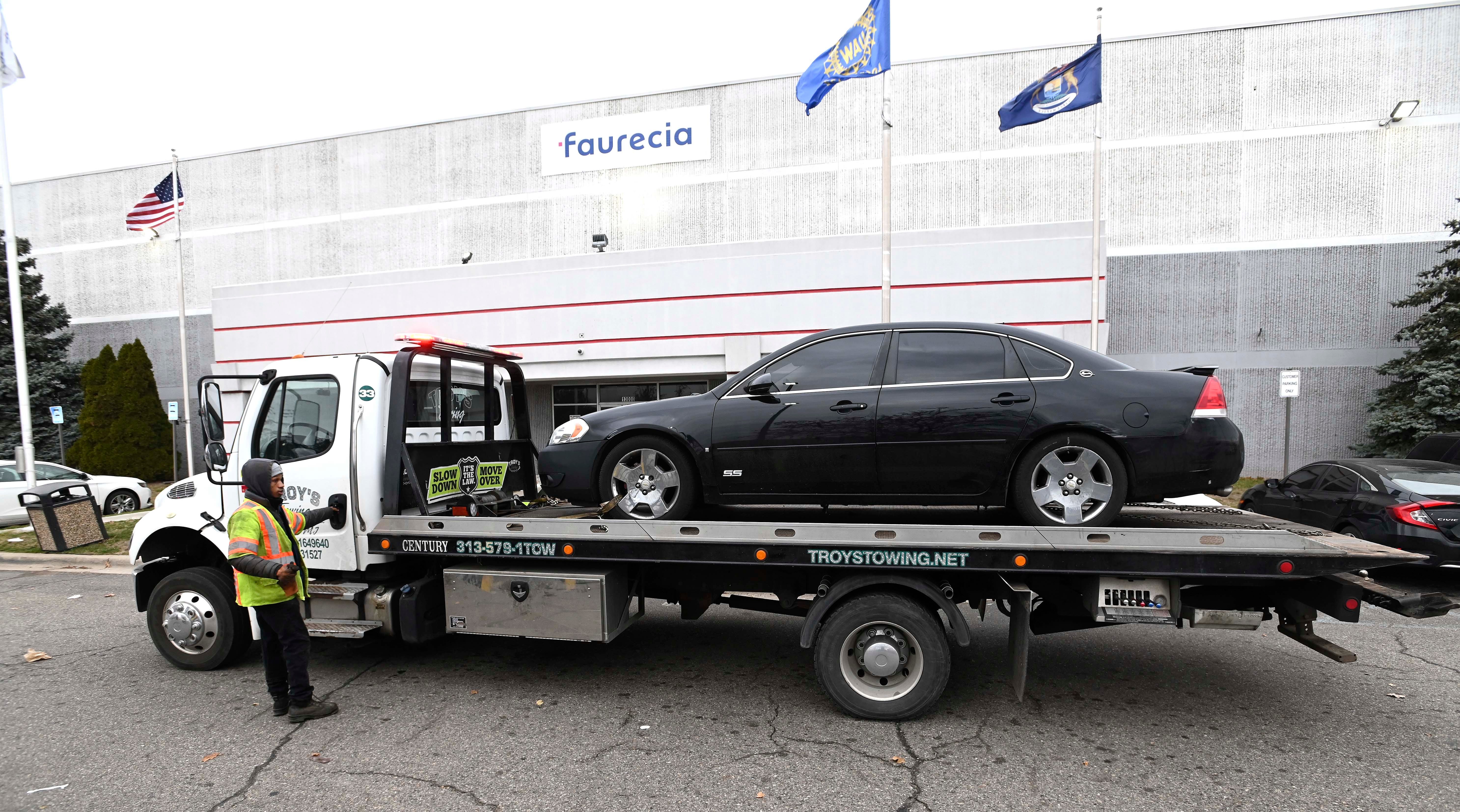 A Chevy Impala SS is towed from the scene, Wednesday afternoon, December 14, 2022.