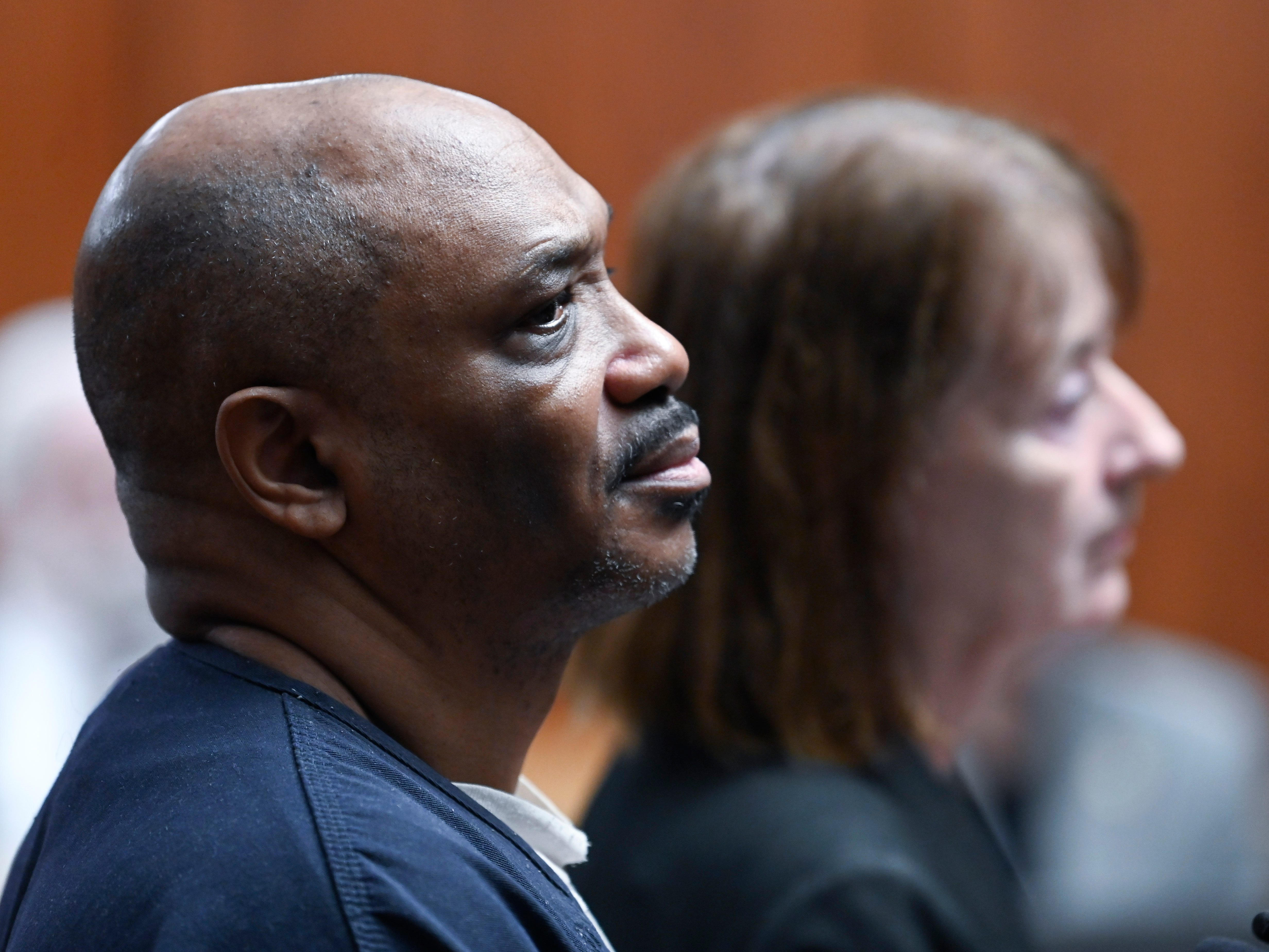 Murderer Arthur Williamson, left, stands with his defense attorney, Joan Morgan, as he is sentenced to life in prison without parole.