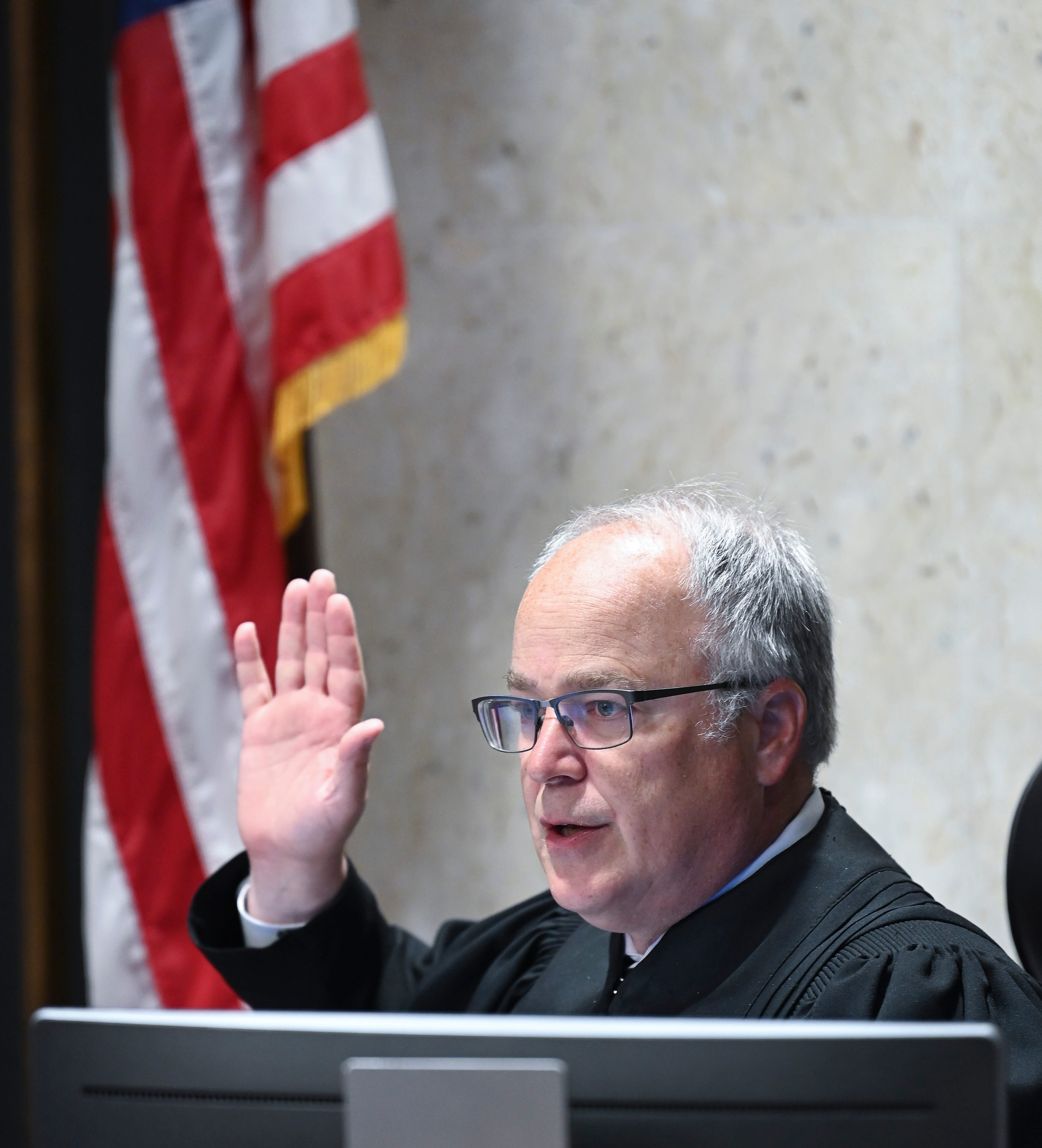 Macomb County Circuit Court Judge James Biernat swears in another defendant in a different case, Thursday, June 1, 2023, before Arthur Williamson is sentenced to life in prison without parole for the murder of WWJ Newsradio 950 AM personality Jim Matthews (aka Jim Nicolai) and others.