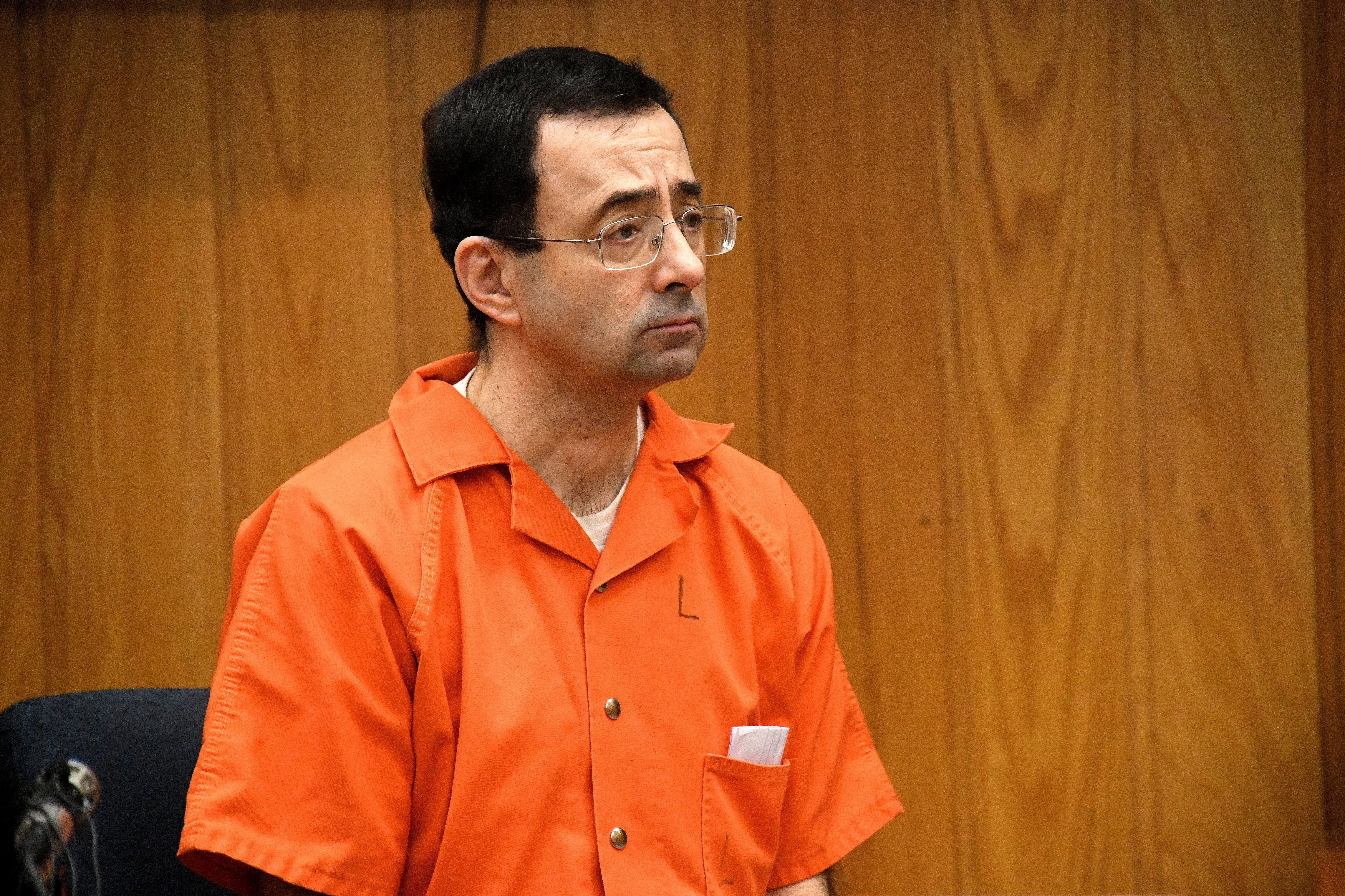 Larry Nassar appears in the court of Judge Janice Cunningham and receives a sentence of 40-125 years in prison on Monday, Feb. 5, 2018 in Charlotte, Michigan.